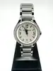 montre baume & mercier linea 65616 avec une lunette ornée de diamants et mouvement quartz, bracelet en acier