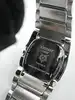 montre tissot t009310a t moments, mouvement quartz avec bracelet en acier