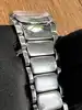 montre tissot t009310a t moments, mouvement quartz avec bracelet en acier