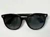 paire de lunette de soleil gucci gg0091s