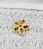 pendentif en forme de fleur avec 5 pétales en citrine facettée or 750 millième (18 ct) 1,64g