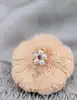 pendentif fleur orné de 5 perles de culture centrées d'un rubis or 750 millième (18 ct) 0,67g