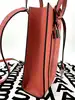 petit sac cabas marc jacobs en cuir grainé orange avec bandoulière amovible et réglable