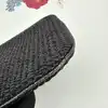 pochette lancel noir effet paille