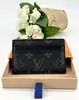 porte-cartes double louis vuitton en toile monogram et cuir noir