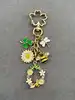 porte-clés abeille fleurs et trèfle