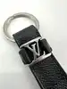 porte-clés dragonne louis vuitton en toile damier graphite et finition argenté