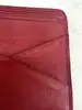 portefeuille louis vuitton multiple pour homme en cuir rouge