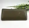 portefeuille michael kors carryall en cuir vert olive