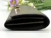 portefeuille michael kors carryall en cuir vert olive