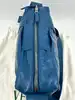 sac à bandoulière bottega veneta cassette en cuir bleu