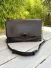 sac à  rabat vanessa bruno moon en cuir noir avec bandoulière