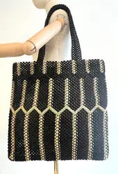 sac cabas agnès b denise en nylon recyclé tressé noir et beige