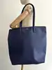 sac cabas zippé lacoste bleu marine