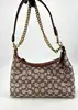 sac coach juliet 25 en tissu jacquard textile signature avec deux bandouliàres