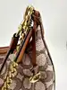 sac coach juliet 25 en tissu jacquard textile signature avec deux bandouliàres