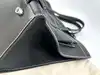 sac just campagne en cuir noir