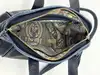 sac lancel charmeuse en cuir bleu marine