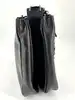 sac porté épaule paco rabanne en cuir lisse noir avec anse à disques métalliques
