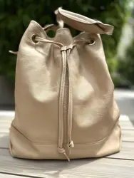 sac seau gérard darel en cuir de chèvre beige