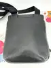 saccoche lancel en cuir noir avec bandoulière