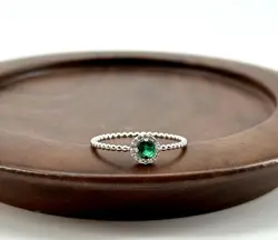 1966450 bague solitaire perlée ronde ornée d'oxydes vert et incolores t58 argent 925 millième (22 ct) 1,3