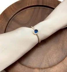 2966460 bague solitaire perlée avec oxydes bleu rond et incolores t54
