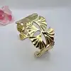 31222764 bracelet manchette motif feuille de ginkgo en acier doré