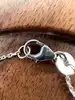 87398218 bracelet orné d'une pierre verte et entourée d'oxydes argent 925 millième (22 ct) 2,2g