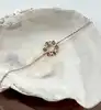 97437318 bracelet à motif fleur orné d'oxydes