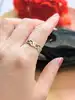 bague bandeau motifs tressés or 375 millième (9 ct) 1,25g
