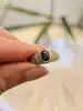 bague bombée en 2 ors centrée d'un saphir or 750 millième (18 ct) 2,61g