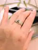 bague bombée en 2 ors centrée d'un saphir or 750 millième (18 ct) 2,61g