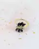 bague cocktail sertie de 6 saphirs navettes et 6 petits diamants taille brillant or 750 millième (18 ct) 4,80g