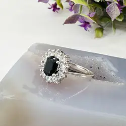 bague marguerite centrée d'une pierre bleue entourée d'oxydes t54 argent autre 3,03g