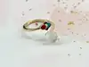bague ouverte en émail et ornée d'une pierre de lune