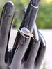 bague serpent en or ornée d'une pierre de lune forme goutte d'eau or 375 millième (9 ct) 2,11g