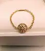 bague souple dior rose des vents en or jaune et nacre or 750 millième (18 ct) 1,08g