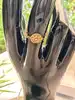 bague souple dior rose des vents en or jaune et nacre or 750 millième (18 ct) 1,08g