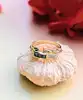 bague style art déco en 2 ors centrée de 3 saphirs carrés et 2 diamants or 750 millième (18 ct) 3,05g