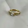 bauge solitaire ornée d'oxydes en métal doré
