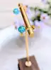 boucles d'oreilles avec boule bleue en verre de feuille d'or or 750 millième (18 ct) 1,82g