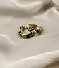boucles d'oreilles céoles en émail noir motif fleurs roses