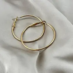 boucles d'oreilles créoles en acier doré