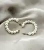 boucles d'oreilles créoles ornées de perles synthétique