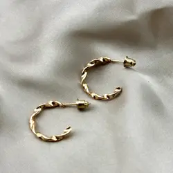 boucles d'oreilles créoles torsadées en acier doré