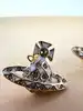 boucles d'oreilles vivienne westwood modèle harlequin orb doré et blanc