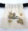 boucles d'oreilles vivienne westwood modèle harlequin orb doré et blanc