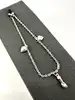 bracelet à breloquesen argent avec pendentifs coeurs et main figa argent autre 1,98g