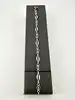 bracelet des maillons ovales lisses et des motifs ajourés en filigrane argent autre 4,99g
